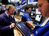 Wall Street ends near flat; small company stocks take the limelight