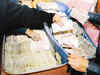 Cash, bullion worth Rs 200 crore seized in raids by NIA & IT