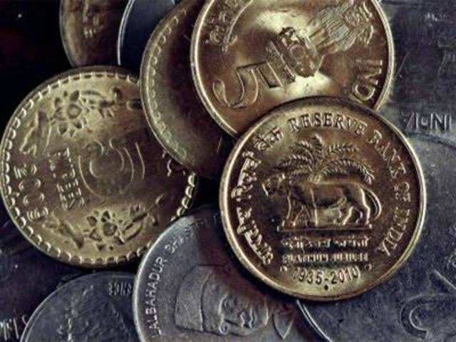 Rupeee trims initial gains; up 14 paise against dollar