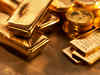 Gold trades below one-month high as Europe data curbs demand