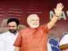 RJD leader praises Modi, says he is PM material, mocks Manmohan