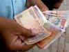 Rupee closes at 61.65 against dollar: Experts' views