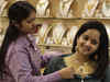 Gold scales new high as rupee plunges