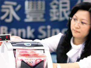 Shanghai S Move To Trade Yuan May Hit Hong Kong The Economic Times - 