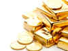 Gold prices gain, crude slip; commodity check by experts