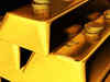 Gold drops on stronger dollar; outlook by experts