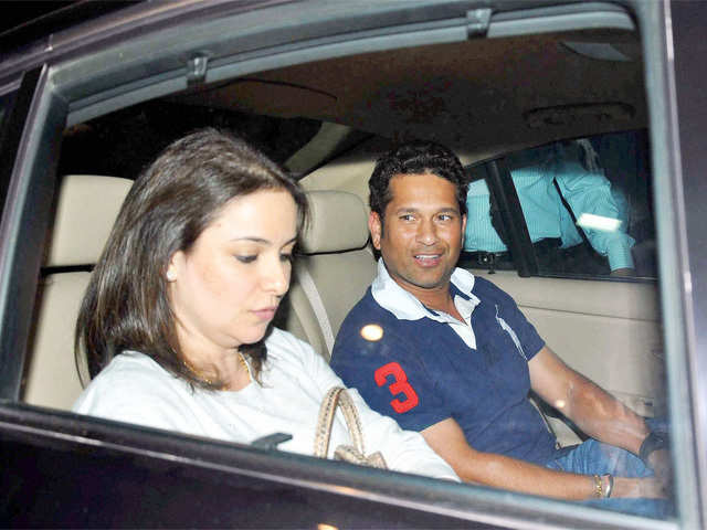 Cricketer Sachin Tendulker with wife Anjali