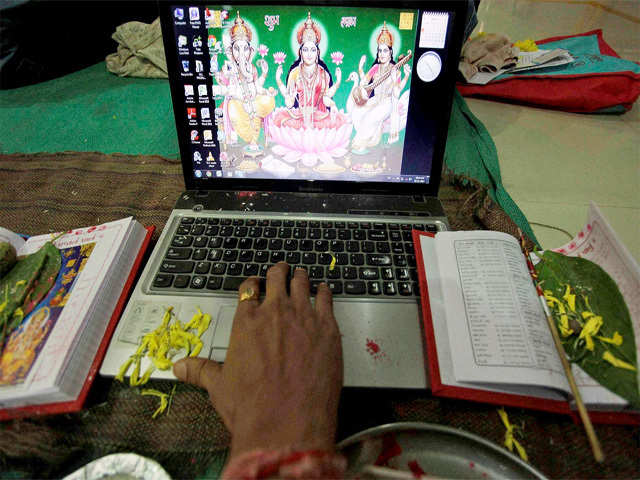 A trader worshiping his account books in Ahmedabad
