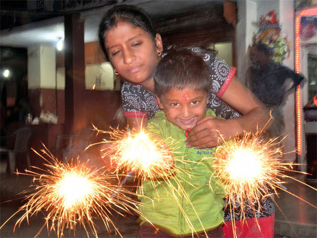 A child celebrating Diwali in Bikaner