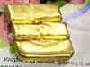 Gold prices gain; outlook on base metals
