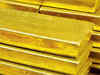 Gold swings on US Federal Reserve stimulus taper uncertainty