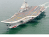 China's first aircraft carrier sails through sensitive Taiwan Strait on its maiden voyage