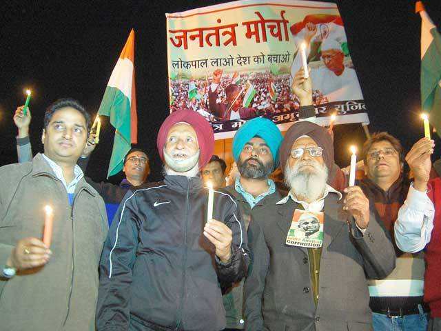 Anna Hazare supporters at candle light march