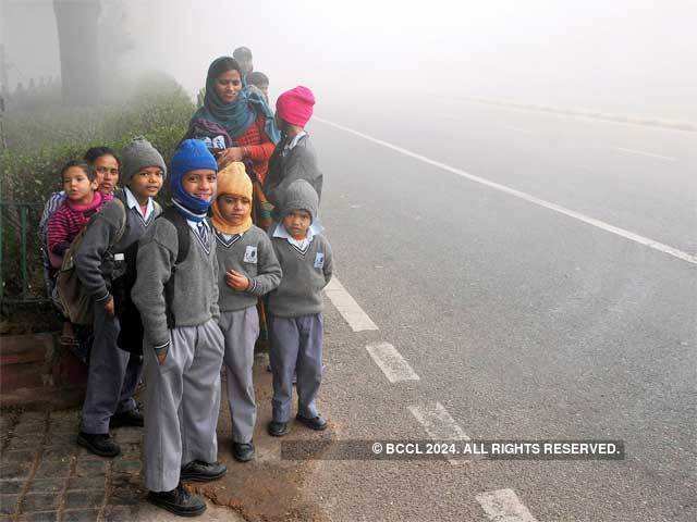 School children wrapped in warm clothes
