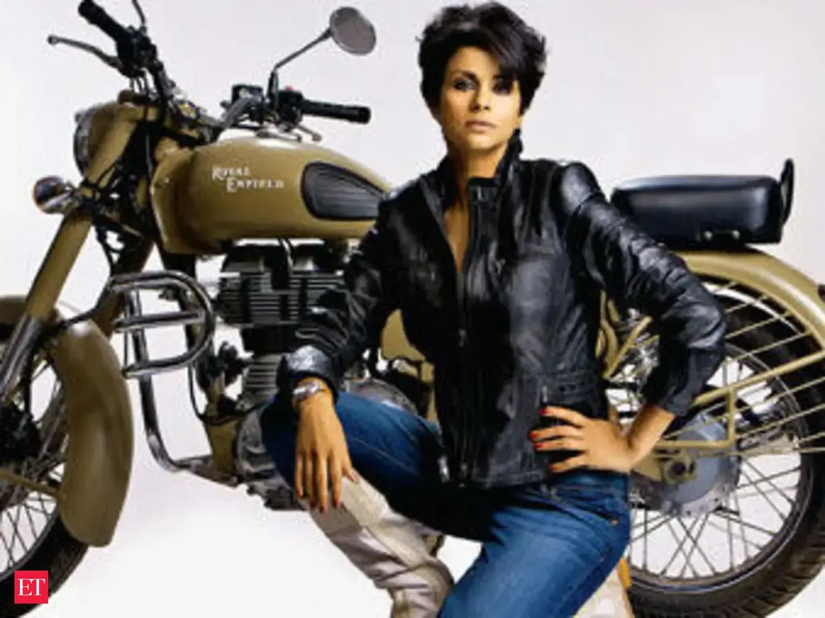 girl riding royal enfield