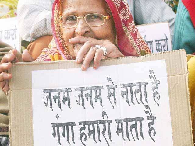 A woman demonstrating in Varanasi