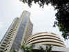 Sensex ends in red; tech, realty up