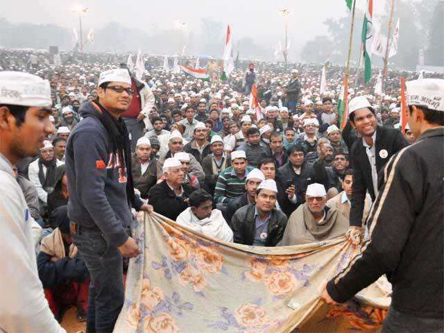 Volunteers collect donations during a rally in Faridabad