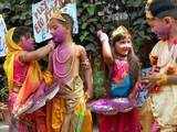 Kids play Holi