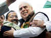 Arvind Kejriwal hugs Kapil Sibal at Eid function