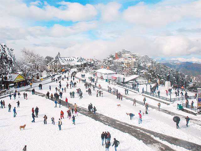 People enjoying fresh snowfall