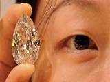 Model holds a 72.22-carat diamond