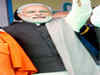 'Teaboy' Narendra Modi milks chai for party