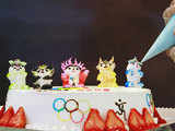 Cake featuring mascots of Olympic Games