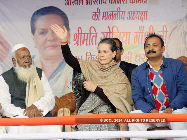 Sonia Gandhi waves to a crowd
