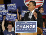 Barack Obama gestures at a campaign rally