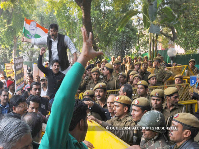 Congress supporters protesting against Delhi chief minister Arvind Kejriwal
