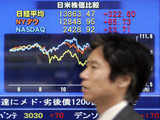 Japan's Nikkei closes 2.4% up