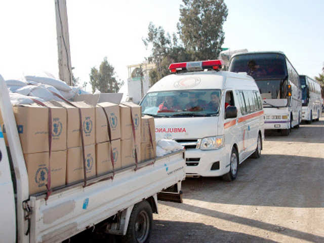 A truck carrying humanitarian aid in old Homs city