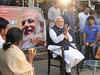 Narendra Modi sips tea at 'chai pe charcha' campaign, attacks Congress on governance, black money