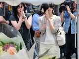 Women Offer Prayer for the Victims of Stabbing at Tokyo