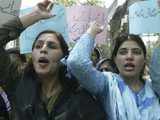 Pakistani house wives chant slogans against govt