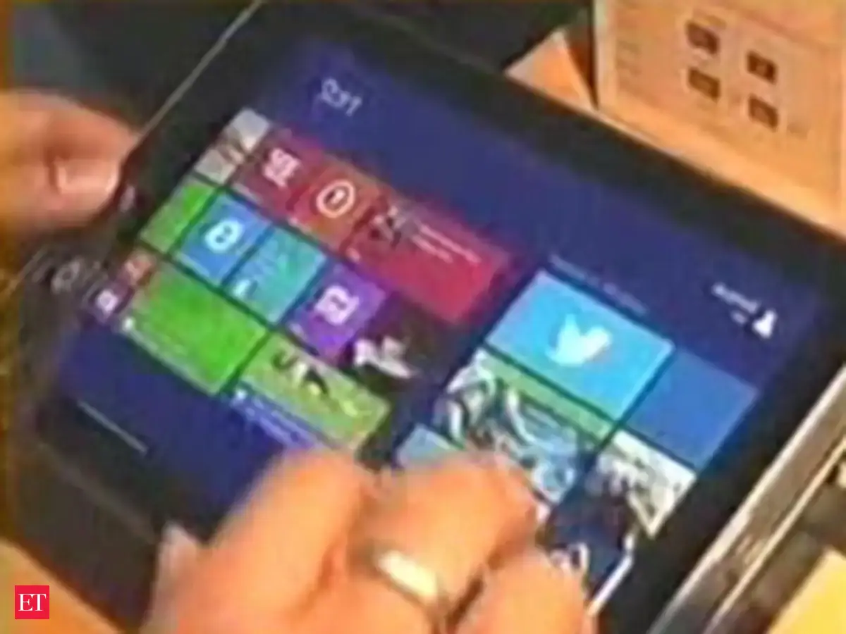 Microsoft unveils Windows based new tablet - The Economic Times Video ...