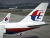 China says its aircraft not conducting overland searches for missing Malaysian plane