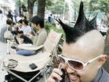 Apple fan lines up to buy an iPhone in Tokyo