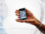 Diane Sot displays her new Apple iPhone 3G
