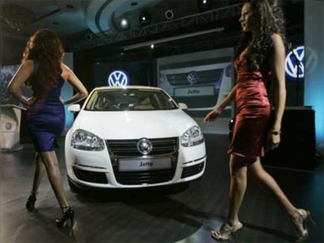 Models pose with the Volkswagen Jetta