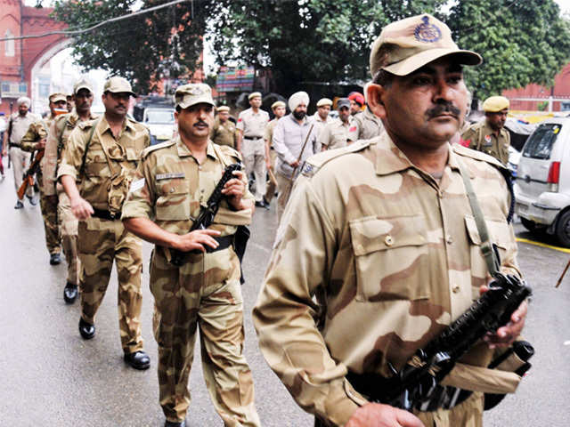Security men march ahead of LS Polls in Amritsar