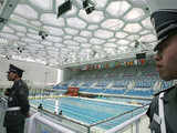 Guards keeping a watch at Water Cube