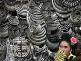 A vendor sells ethnic silver ornaments