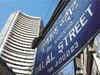 Sensex bounces back from lows; Nifty ends flat