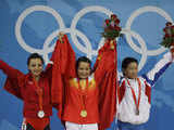 Chen poses with other medallists