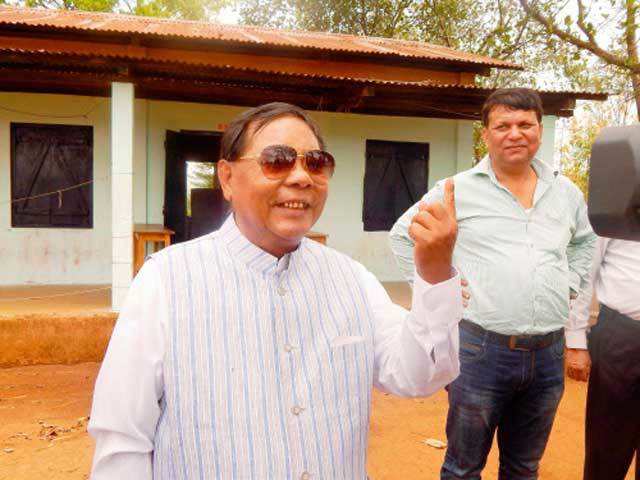 PA Sangma shows his ink-marked finger