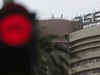 Sensex opens in red; banks, realty down