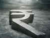 Rupee falls 14 paise to 60.31 against dollar in early trade