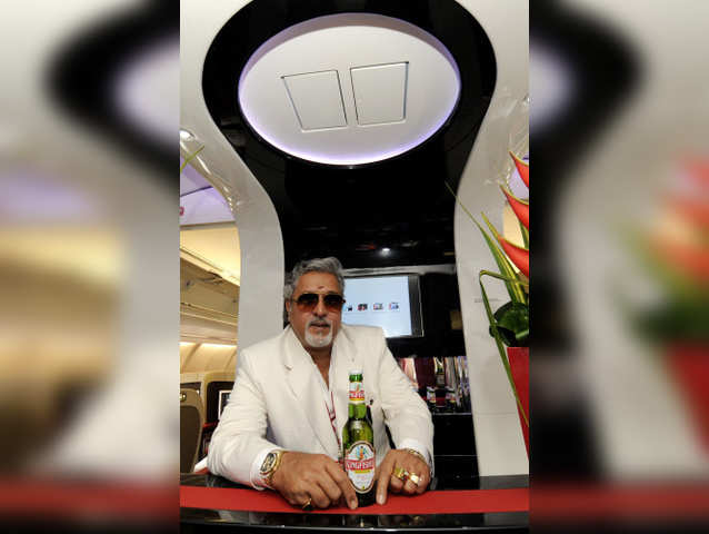 Vijay Mallya at a bar aboard a Kingfisher Airlines Airbus A330